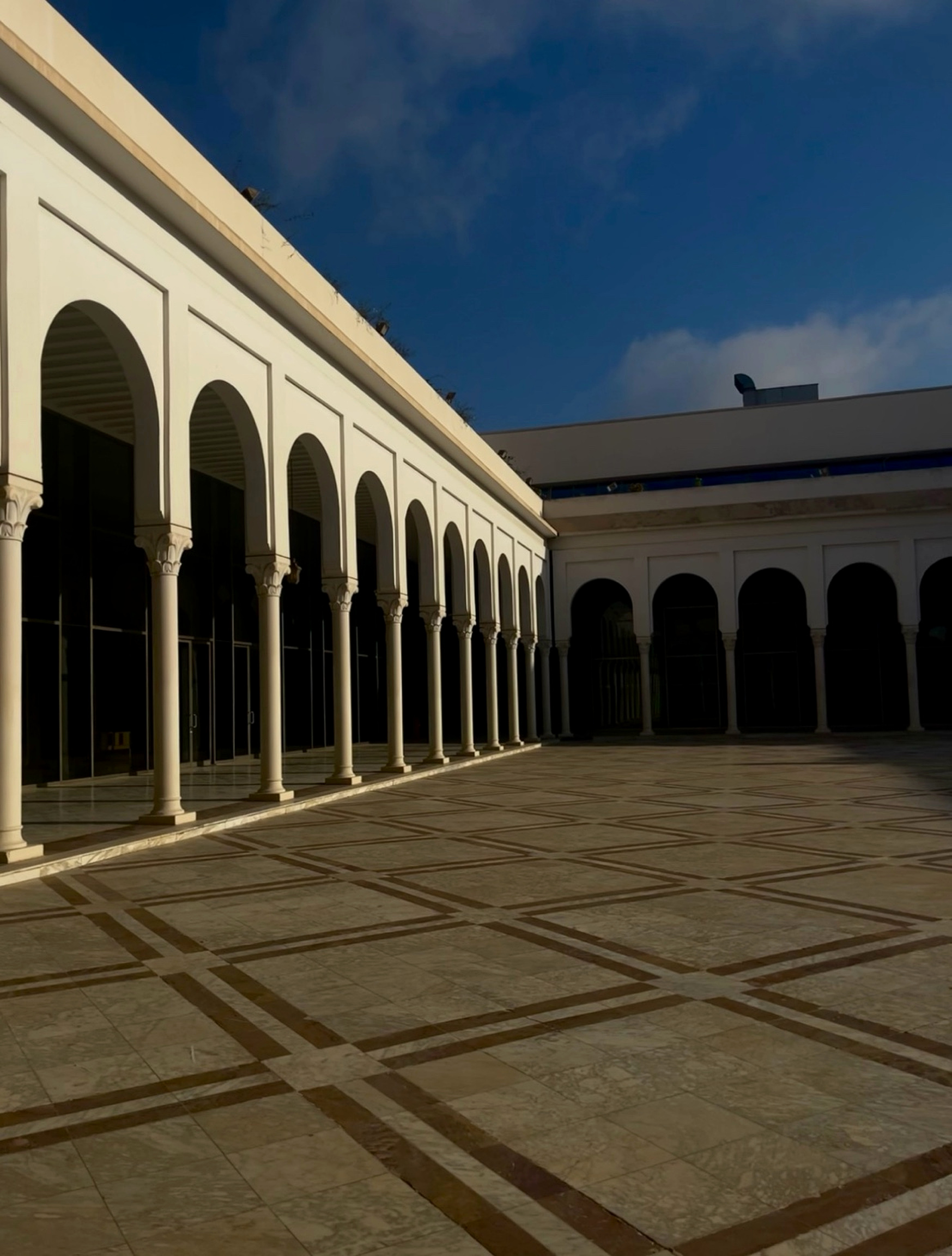 Sunlit arched courtyard in Algeria